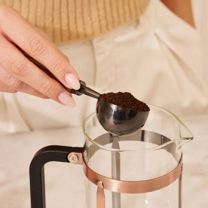 Ground coffee into French press